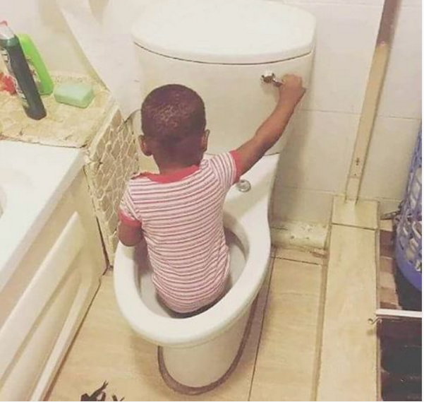 Picture of little Boy flushing himself down toilet goes viral Naija