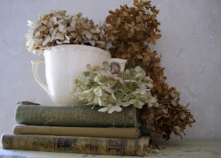 natural decor dried hydrangeas antique books display