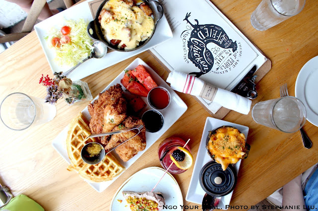 Chicken ‘n’ Watermelon ‘n’ Waffles, honey hot sauce, chilled spiced watermelon, cheddar cheese chow chow waffle, bourbon maple syrup at Yardbird Southern Table & Bar Chicken ‘n’ Watermelon ‘n’ Waffles, honey hot sauce, chilled spiced watermelon, cheddar cheese chow chow waffle, bourbon maple syrup at Yardbird Southern Table & Bar