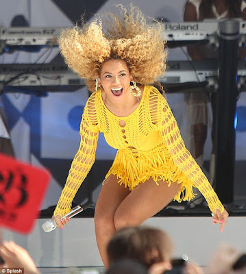 Beyonce with a ton of curls