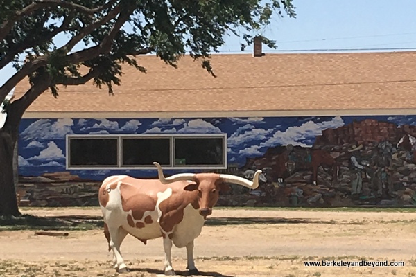 longhorn statue outside Milburn-Price Culture Museum on Route 66 Historic District in Vega, Texas longhorn statue outside Milburn-Price Culture Museum on Route 66 Historic District in Vega, Texas