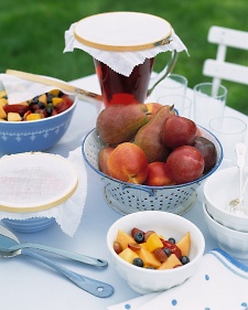 embroidery hoops with some light fabric make perfect container covers for a picnic or outdoor party