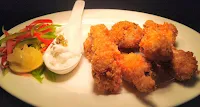 Garnished crispy fried chicken wings
