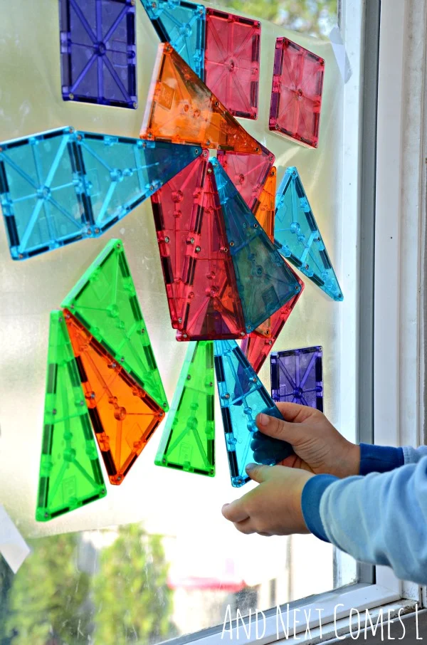 Building with Magna-Tiles on windows from And Next Comes L