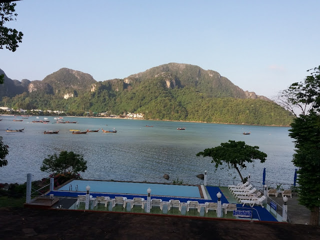 Photo of the view from the dive center at Blue Divers, over the bay and the infinity pool