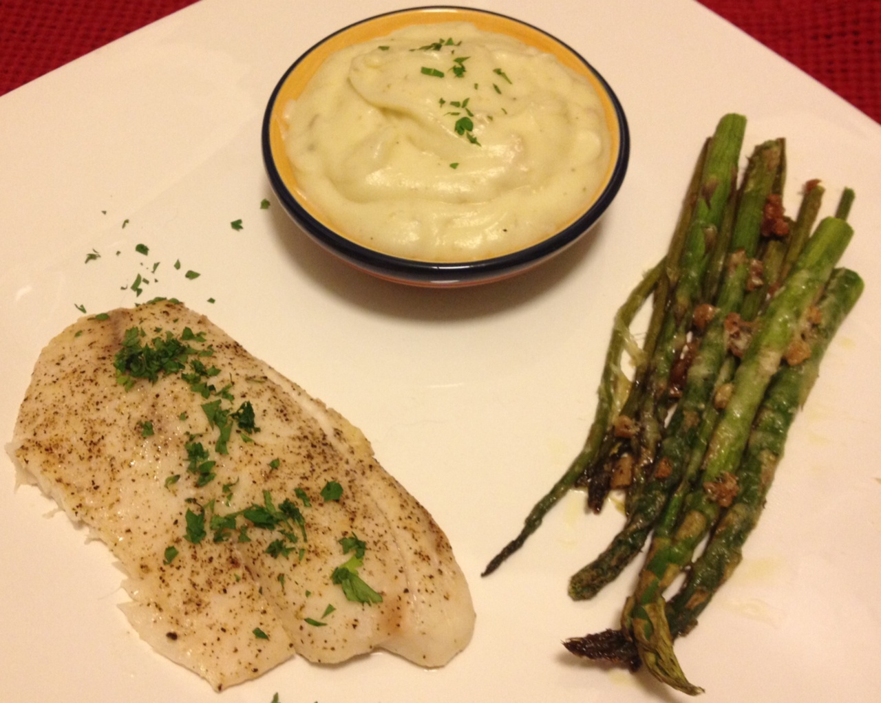 Cooking Brandy Tilapia with garlic mashed potatoes and asparagus
