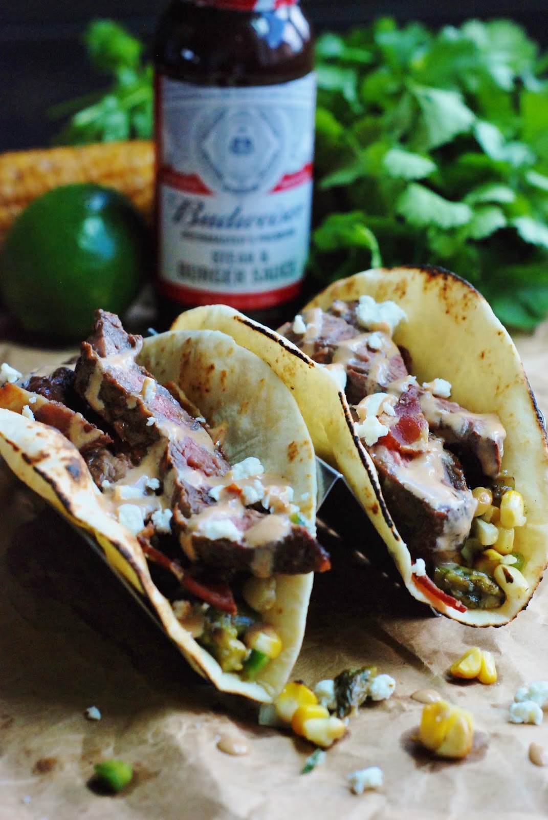 Fleur DeLectable Sizzlin’ Skirt Steak Tacos with Asparagus Corn Salsa