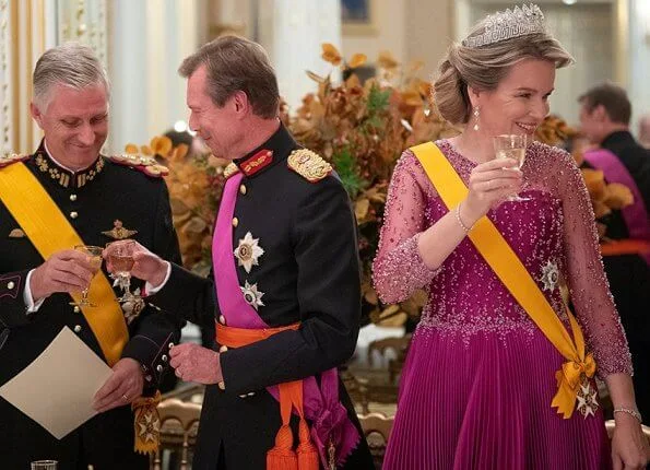 Queen Mathilde diamond tiara, Maria Teresa diamond earrings, Princess Stephanie diamond tiara onyx. Mathilde fuchsia gown