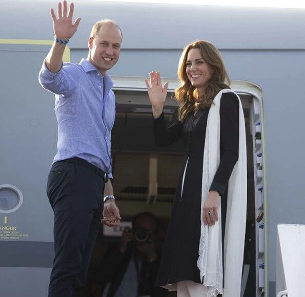 Kate Middleton wore a Kurta by Elan, one of Pakistan's leading design houses. Kate wore a crossover flat shoes by Russell and Bromley