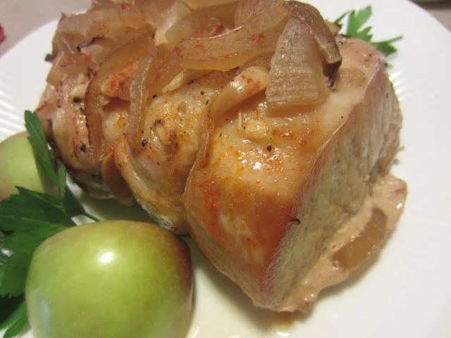 Roasted Pork Loin with Onion Gravy on platter