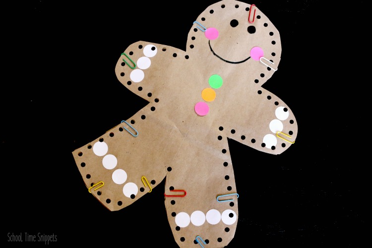 Make your own DIY Jumbo Stuffed Gingerbread Man this holiday season! This adorable gingerbread man craft is great for fine motor skills... who wouldn't want their very own giant gingerbread man?! gingerbread man lacing craft