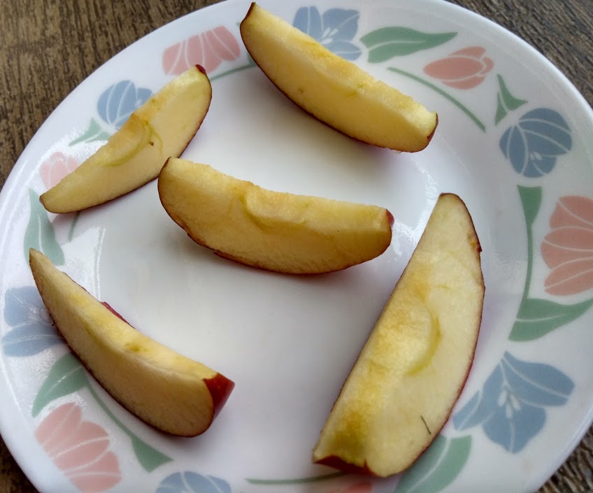 Why cut apples turn brown in color?