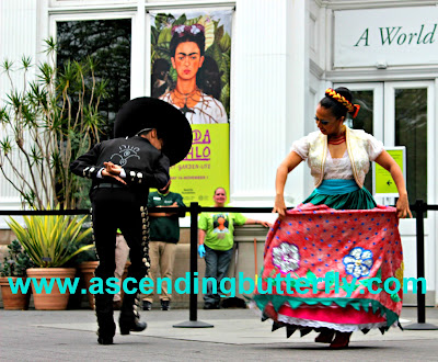 Calpulli Danza Mexicana performing outdoors at Frida Kahlo Art Garden Life Exhibition at The New York Botanical Garden