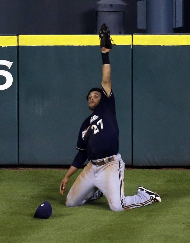 the other paper Carlos Gomez climbs Tal's Hill to make incredible