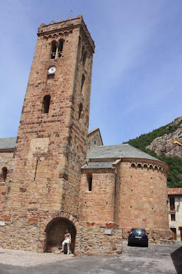 Apse and bell tower of the romanesque church of Coustouges