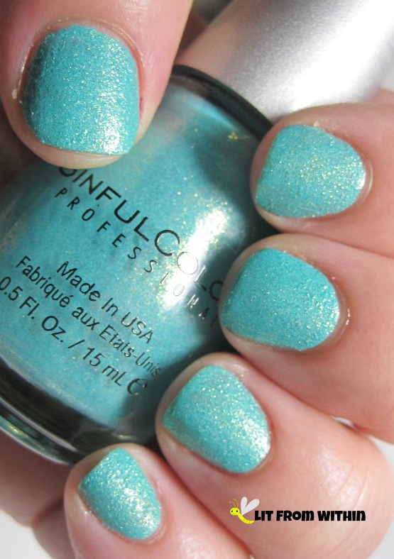 This lovely polish is Sinful Colors Crystal Crush Treasure Chest, a turquoise texture with a gold shimmer. 