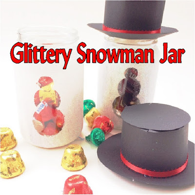 Make a snowman that will last all year long and is super cute with a bit of sparkle, a cute magic hat, and some yummy chocolate candies.  This snowman gift jar is the perfect Teacher gift, neighbor gift, or gift for your best friend.  It's easy and worth every little bit of glitter. #snowman #christmasgift #candyjar #diypartymomblog