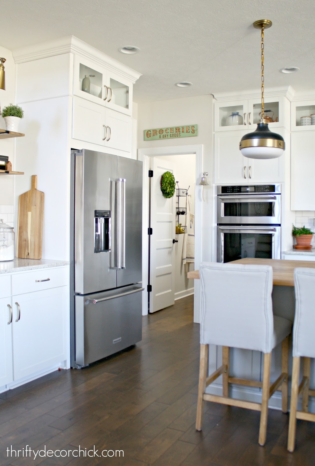 White kitchen with gray island