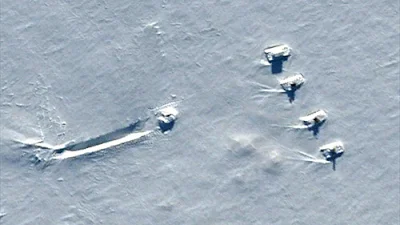 Tanks guarding a UFO in Antarctica.