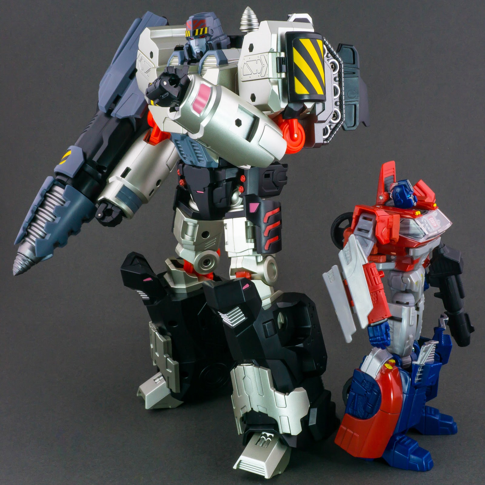 Megatronus and Orion Pax standing back to back