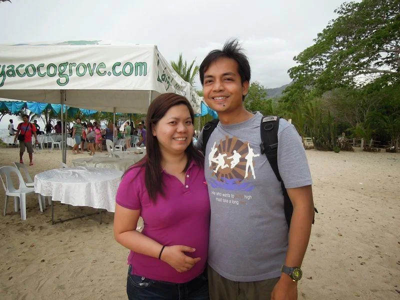 Couple travel bloggers at Laiya Coco Grove Beach Resort