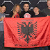 Metallica posing with the Albanian flag