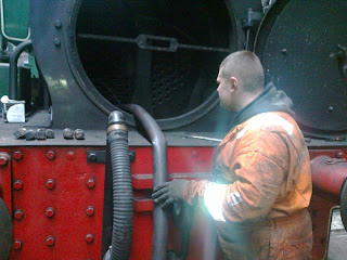 Ryan has been readying No.6 for cold inspection by the boiler inspector next week - here he's washing out the boiler