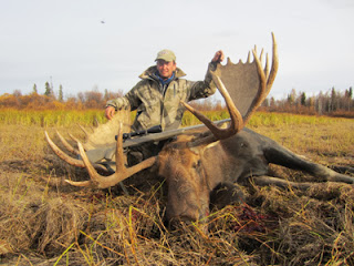 Robert Kathary with Moose