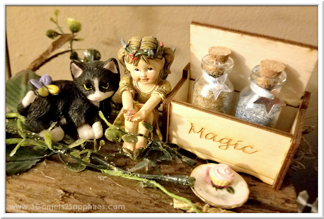 Add a touch of magic to your fairy garden with DIY bottles of fairy dust  |  3 Garnets & 2 Sapphires