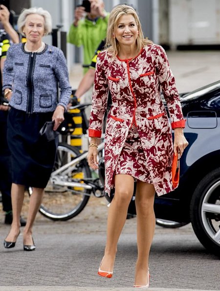 Queen Maxima wore Natan outfits, dress and coat, Natan shoes and carried A Bag With A Story Maharlika Snake Clutch
