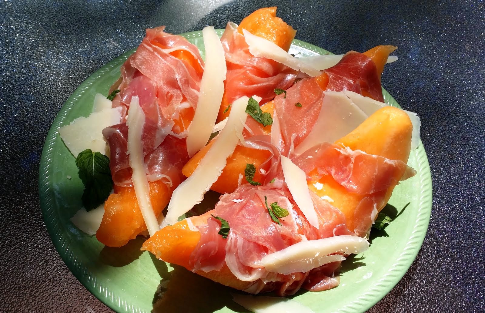 A Table At Robert Ridge Prosciutto Wrapped Melon with Parmesan Shavings