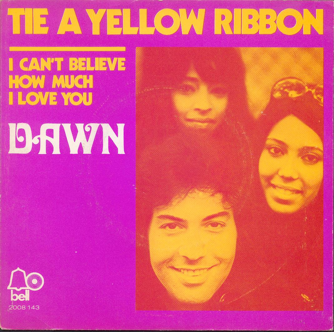 Tie a yellow ribbon round the ole oak tree. Tie a yellow ribbon round. Tie a yellow ribbon round the ole oak tree. Tie a yellow ribbon round. Tie a yellow ribbon round the old oak tree.