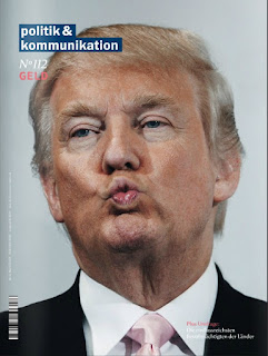 Aktuelles Cover politik & kommunikation 3/2015, Thema Geld Donald Trump kisses