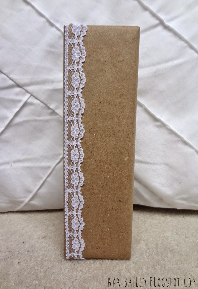 Brown paper gift wrap with lace trim