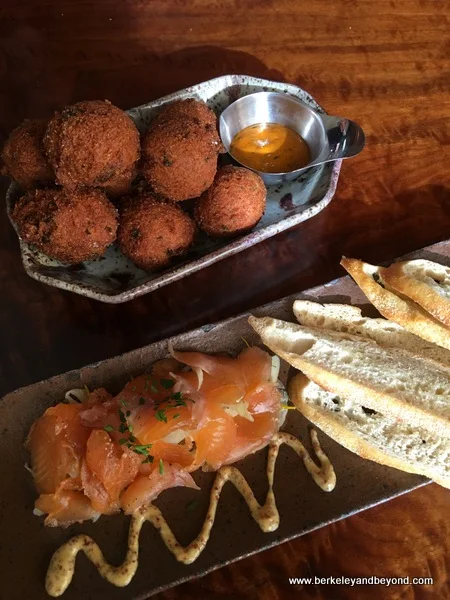 hushpuppies and bourbon-cured trout at Hutch Bar & Kitchen in Oakland, California