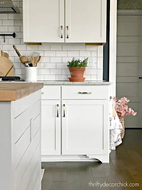 DIY cabinet feet with corbels