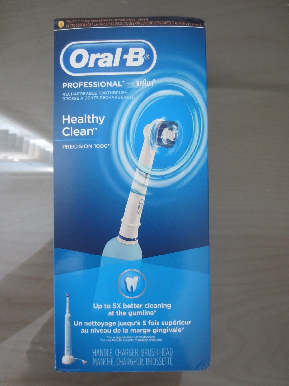 oral-b-pro-white-1000-power-rechargeable-electric-toothbrush-powered-by