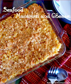 Shrimp and crabmeat take this creamy Seafood Macaroni and Cheese to another level. A few surprise ingredients add to the flavor and texture. | Recipe developed by www.BakingInATornado.com | #recipe #dinner