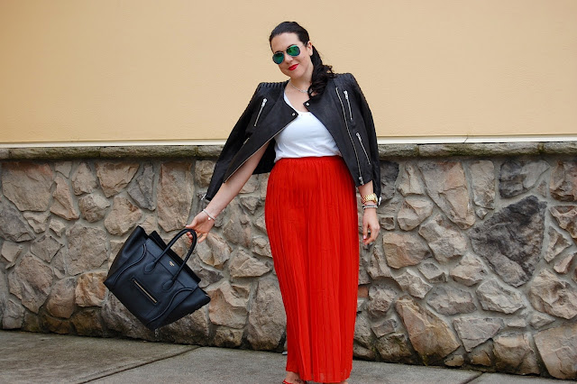 H&M Icons leather jacket, red pleated maxi skirt, Express tank top, Material Girl sunglasses and Celine Mini Luggage Tote.