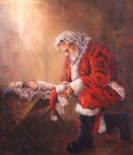 Santa giving his respects to the Baby Jesus