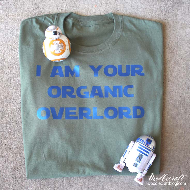 Make a Star Wars themed shirt with Cricut cut iron-on vinyl in blue that reads I am your organic overlord inspired by the Han Solo Movie
