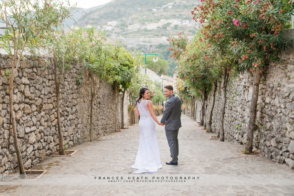 Bride and groom walking in Ravello