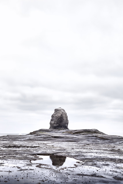 Simple photograph of Black Nab at Saltwick Bay under an overcast sky by Martyn Ferry Photography