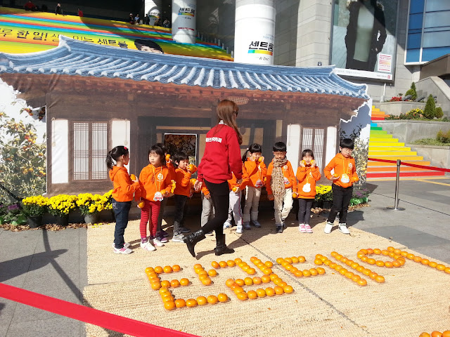 Kids at the persimmon festival at Seoul