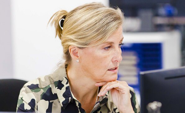 Sophie, Countess of Wessex wore French Connection Camo midi shirt dress in khaki. Countess of Wessex wore a white wool dress, gold earrings