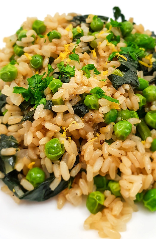 Risoto with kale and peas close up