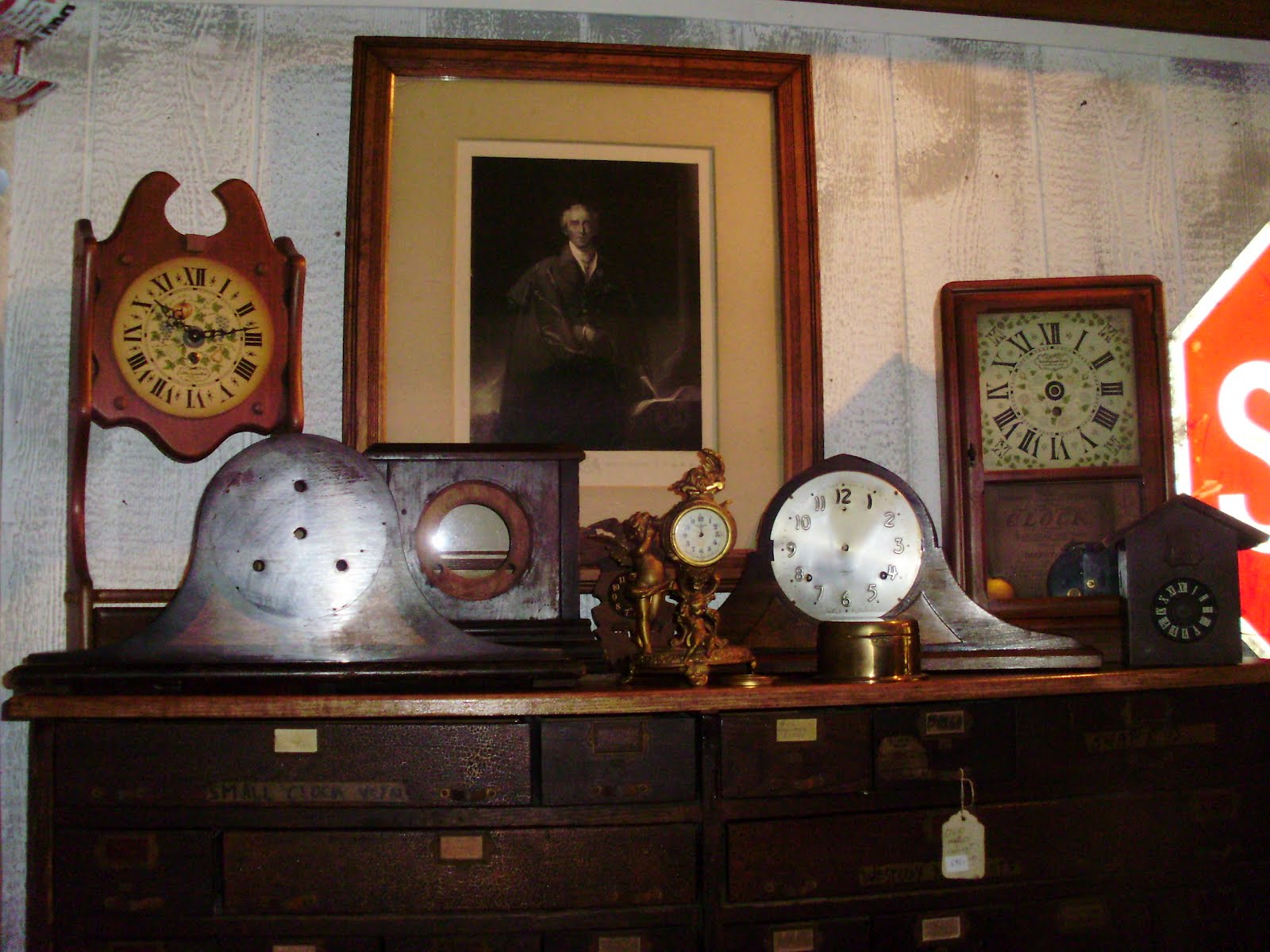 Log Cabin Antiques & Gifts Assorted clock housings and clocks