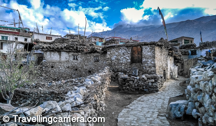 If you watch closely, you see lot of stones and wood blocks as many constituents of houses in Nako Village in Spiti Valley. The dry wood you see on the top of these houses is collected over the months for winters as during winters it becomes hard to get right wood to keep houses warm and for many days it's had to come out of the houses.     Related Post - How to reach Spiti Valley from Delhi and things to do around Kinnaur/Spiti in Himachal Pradesh