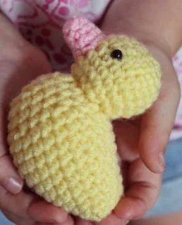 http://thelittleyellowduckproject.org/wp-content/uploads/2014/04/Just-Duckie-Lovey-Pattern-Crochet.pdf