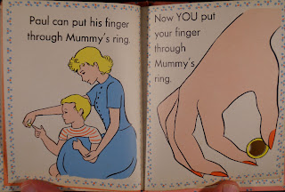 A page showing a child playing with his mother's ring, and a life-sized ring with a cut-out in it.